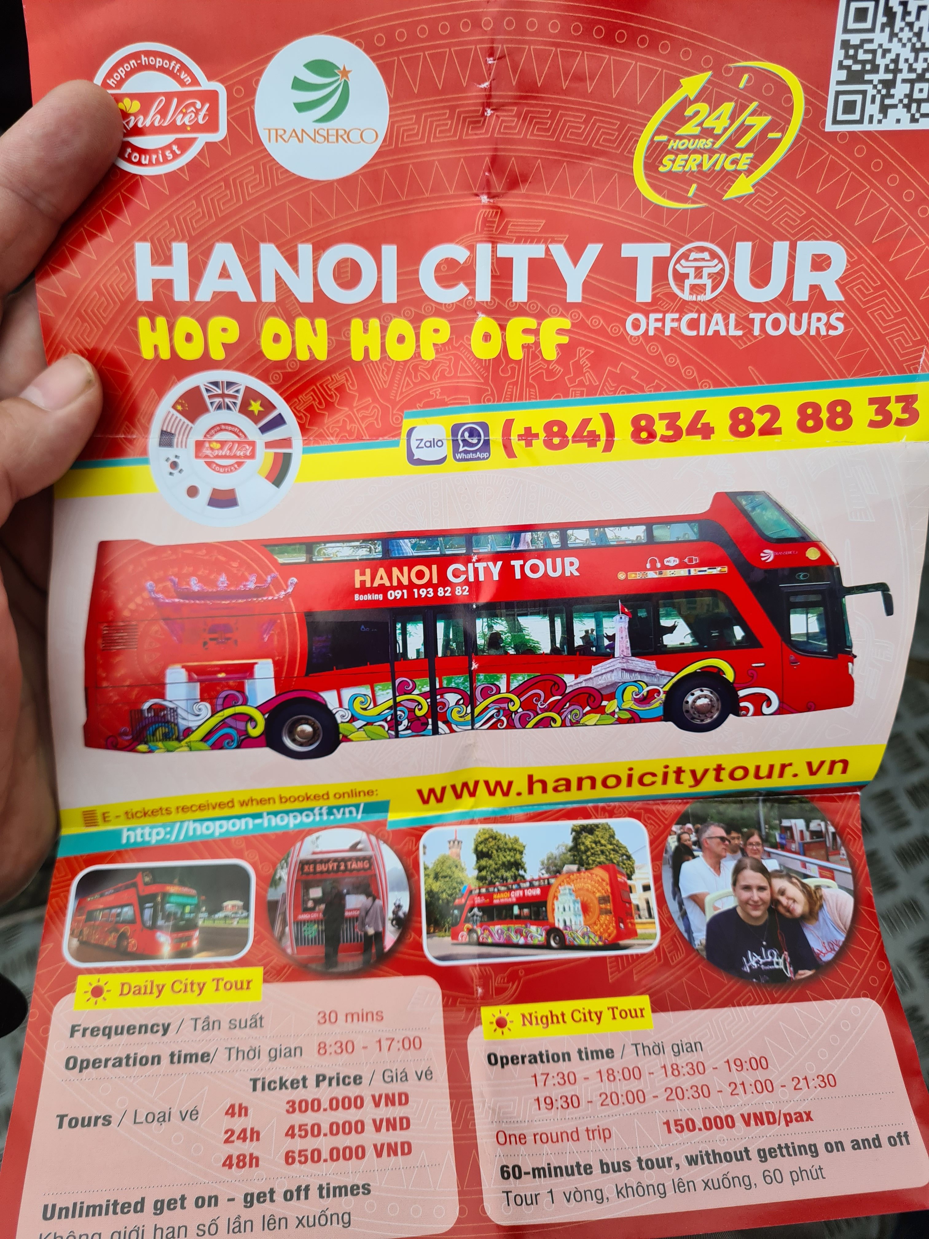Brochure for Hanoi City Tour featuring a red hop-on hop-off bus, service information, and ticket prices.